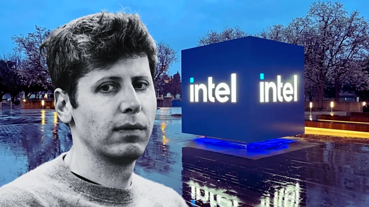 Intel sign lit up in the evening with a person